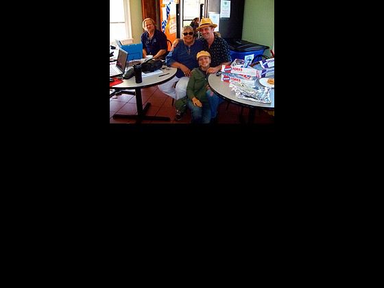 Big D with WWOZ volunteers Betty Jane Schlater and Melissa and Matt DeOrazio. 
