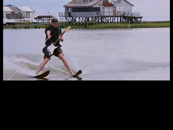 Water skiing guitarist