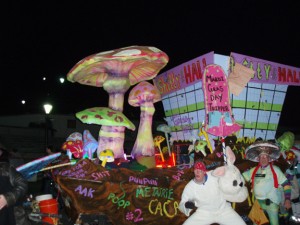 Krewe du Vieux float and paraders of mushrooms and mushroom food.
