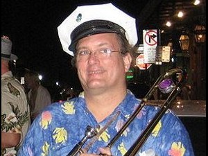 Dan Meyer holding hsi trombone