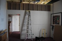 photo of ladder next to drywall in-progress